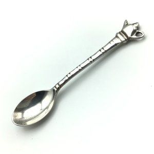 Aldas Dematasse spoon with teapot figure on handle India. (silver/silverplate)